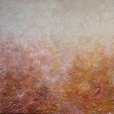 Textura abstracta en tonos cálidos de rojo, naranja y beige, con efecto difuminado.